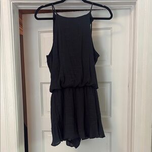 Navy Sleeveless Romper with Open Back and Flowing Skirt